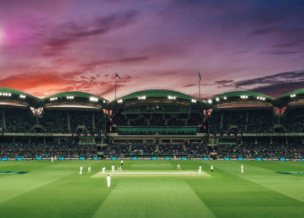 Cricket pitch with sunset.