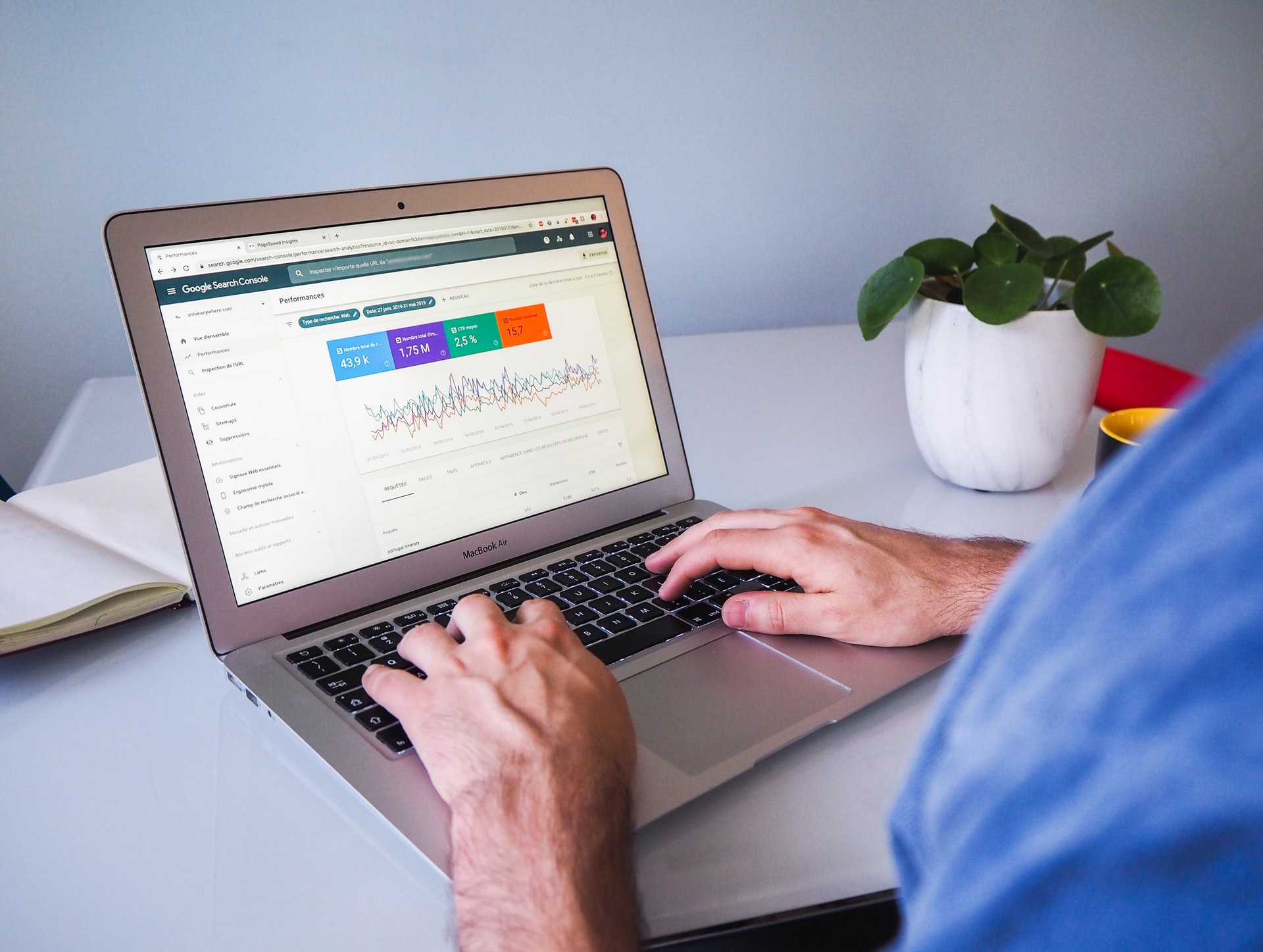 a member of staff at an SEO agency in manchester creating a new SEO strategy based on performance data