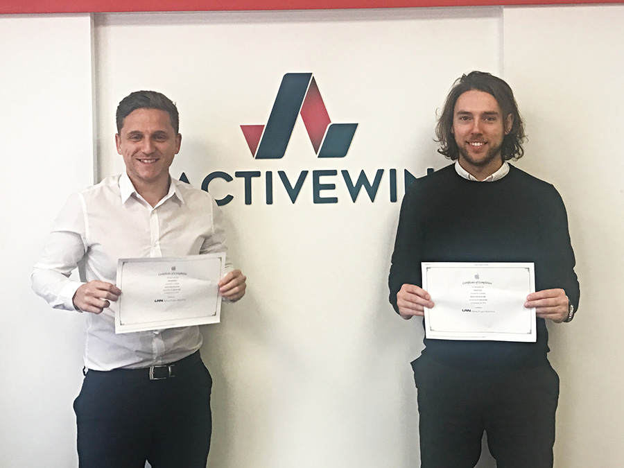 an image of 2 staff members at active win a ppc agency in manchester